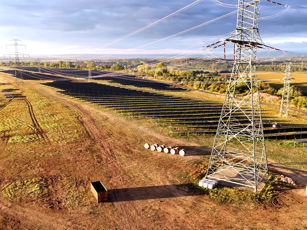 High-voltage towers on the PV construction site